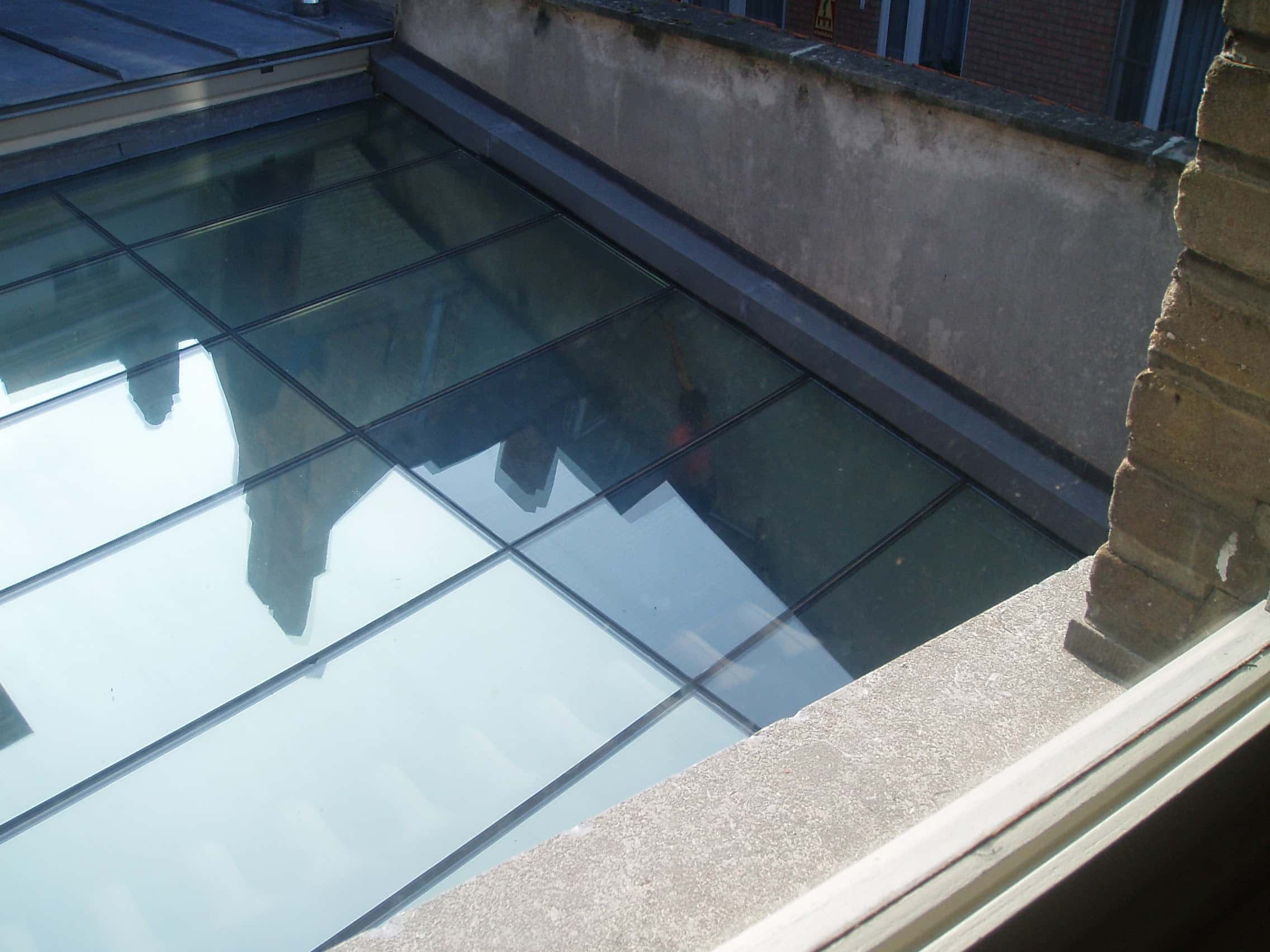 Choco Story Brugge - glazen dak van de binnenplaats voorzien van Clearview 20